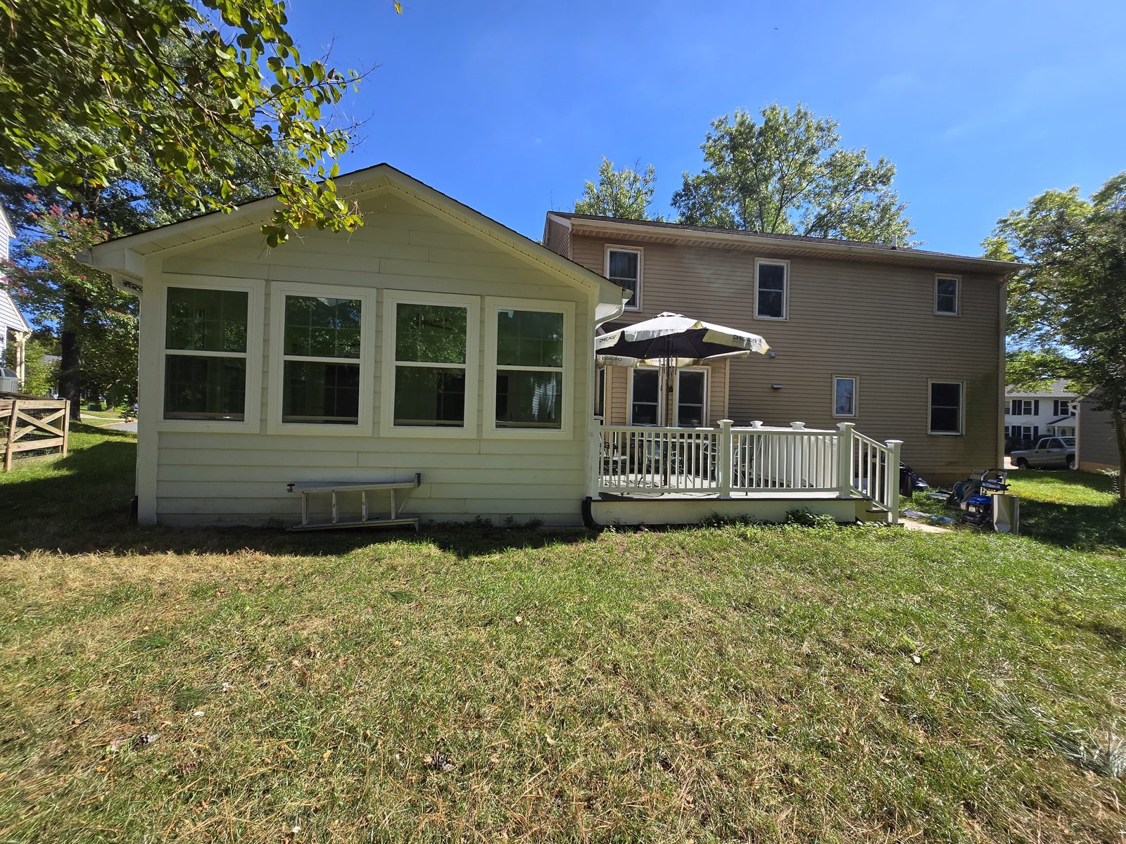 Completed sunroom addition — rear of home, Northern Virginia